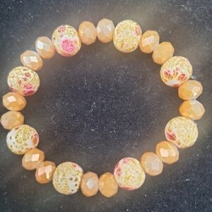 Elegant Handmade Beaded Bracelet in Pink and Gold